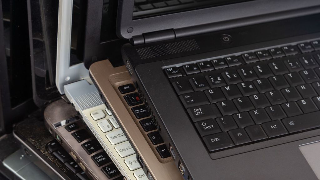 stack of old laptops