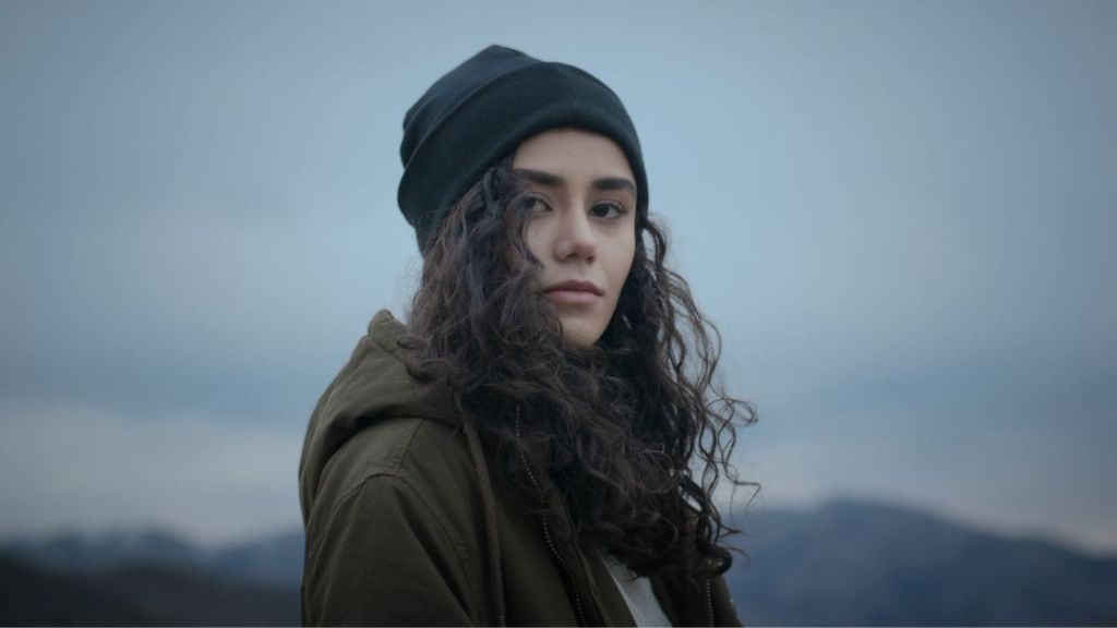 Sad young woman outside