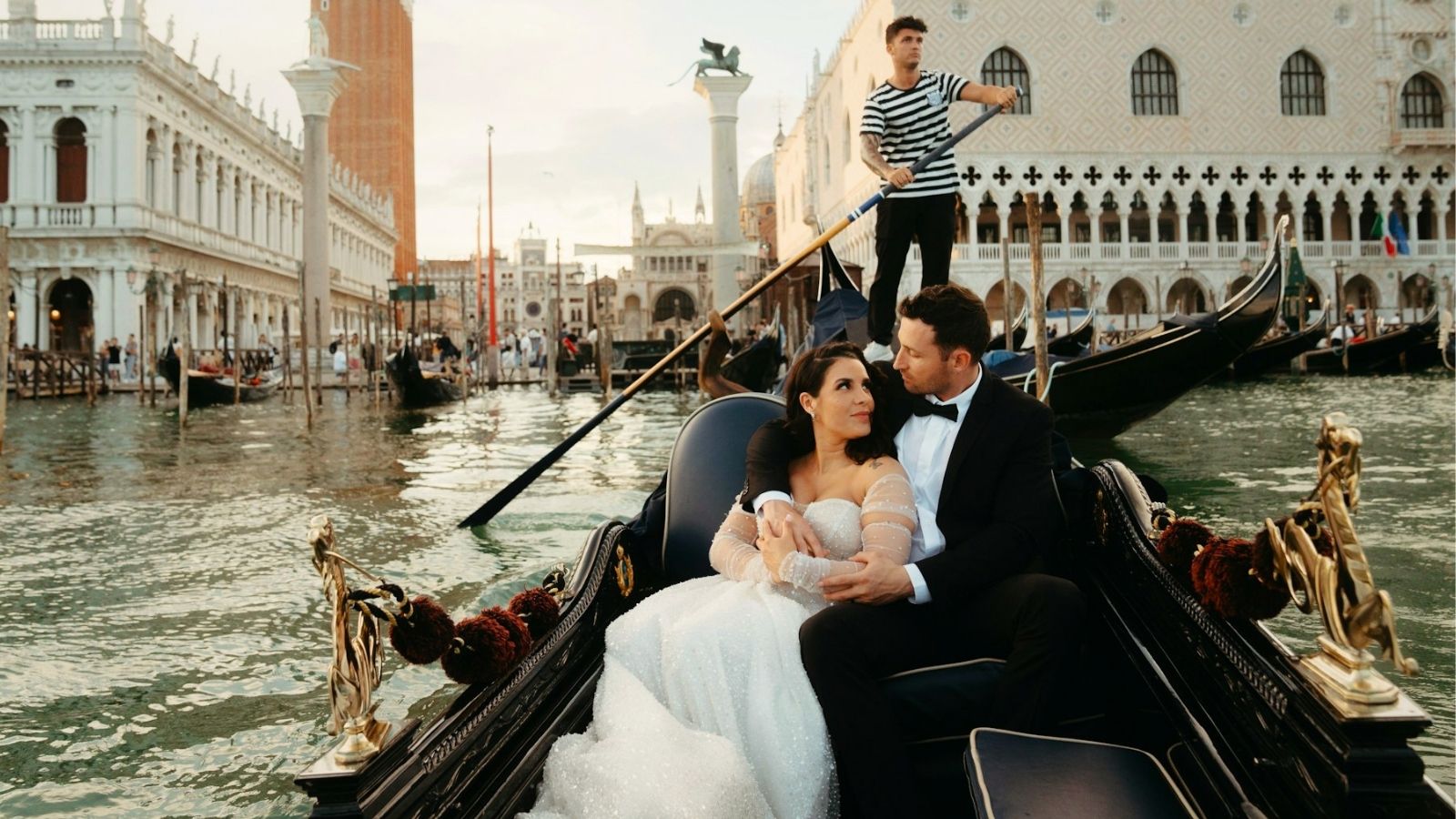 His Sibling Planned an Expensive Destination Wedding—So the Couple Decided They Wouldn’t Go Couple on a boat in Venice