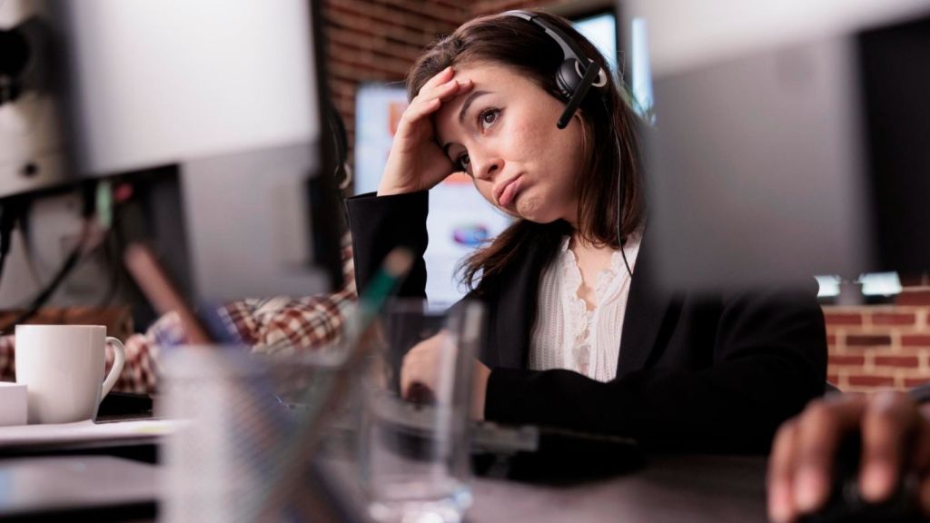 Frustrated woman at customer support job
