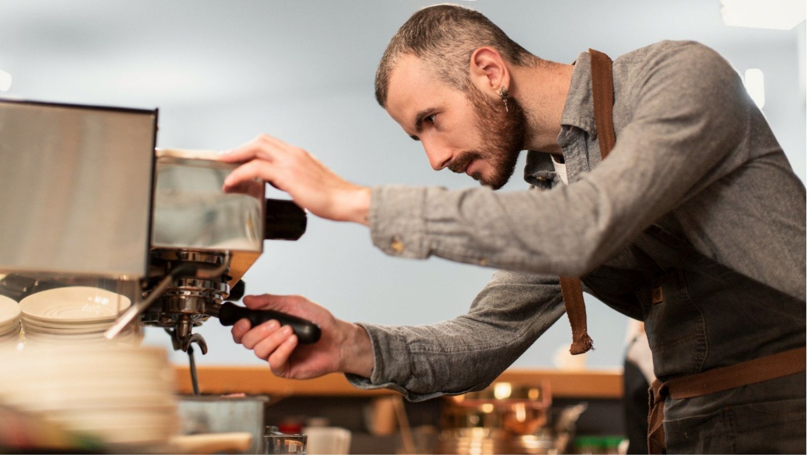 A Technician Checked a Broken Coffee Machine—and Found a €400 Quick Fix Gone Wrong Man using a coffe machine