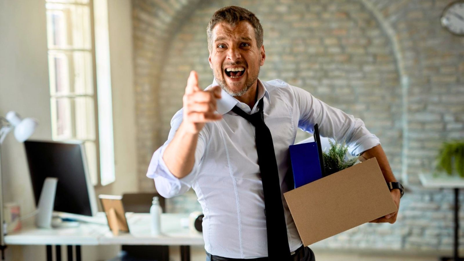 Man happily quitting his job