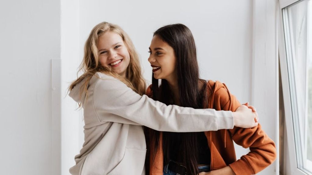 Two women enjoying each other's company at home