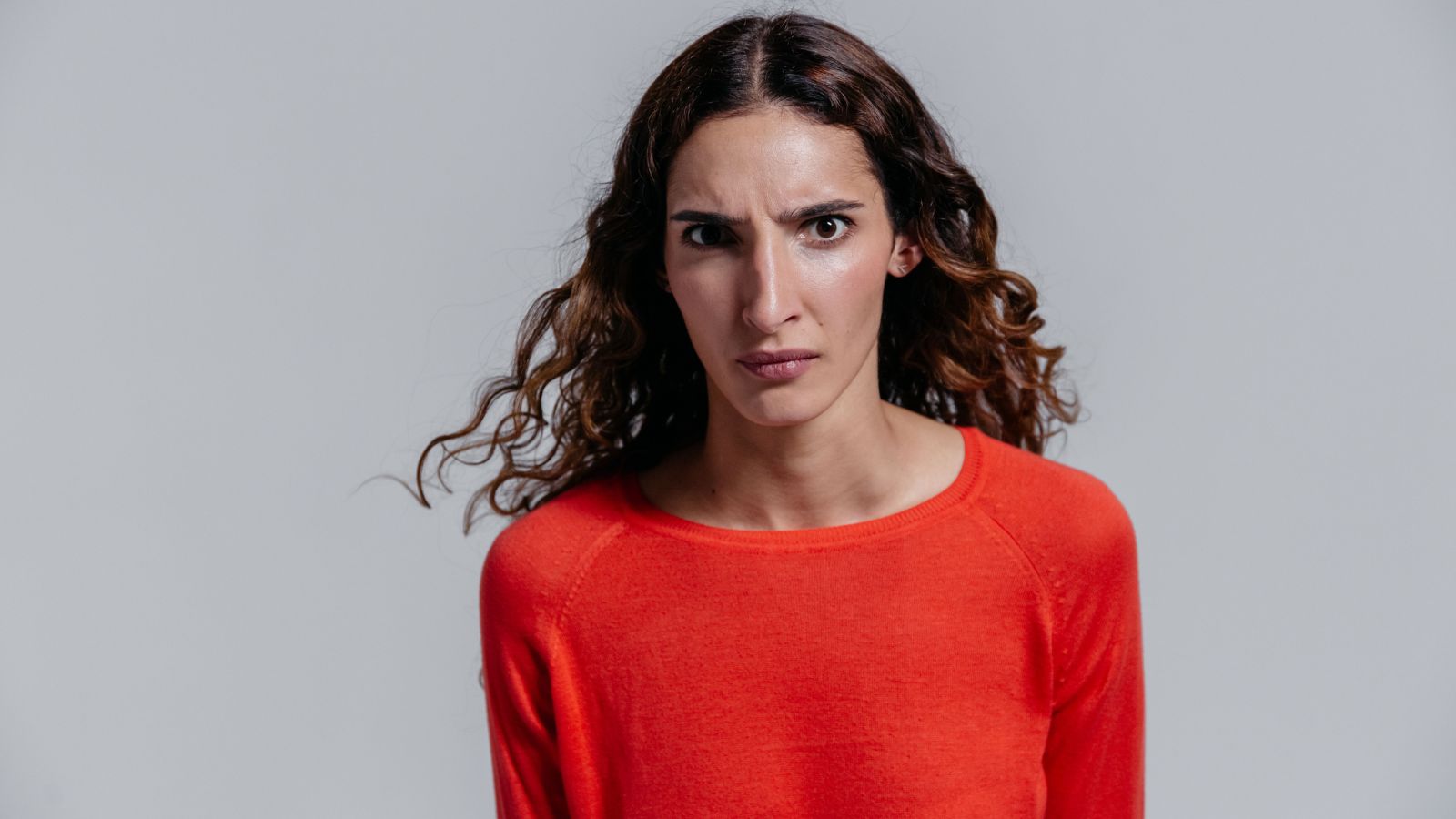 Woman in red sweater 
