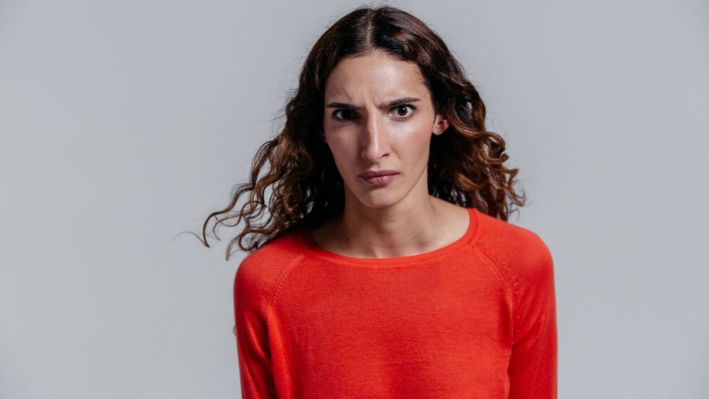 Woman in red sweater