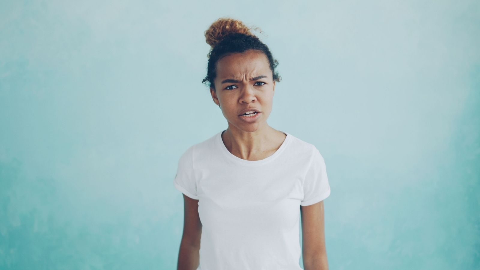 It Starts so Subtle: Survivor Exposes the Real Strategy Behind Gaslighting—And Why People Do It Woman look irritated and angry