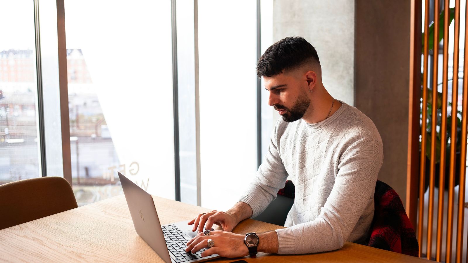 Startup Wanted To Build Another App—One Employee Explained Why It Was A Costly Mistake man in grey shirt working
