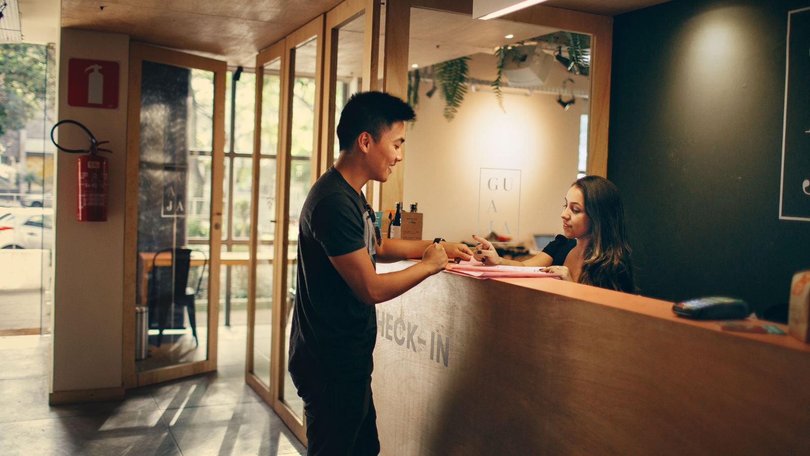 Busted: Hotel Guests Facing Criminal Charges After Employee Catches Them in Public Restroom Reception front desk