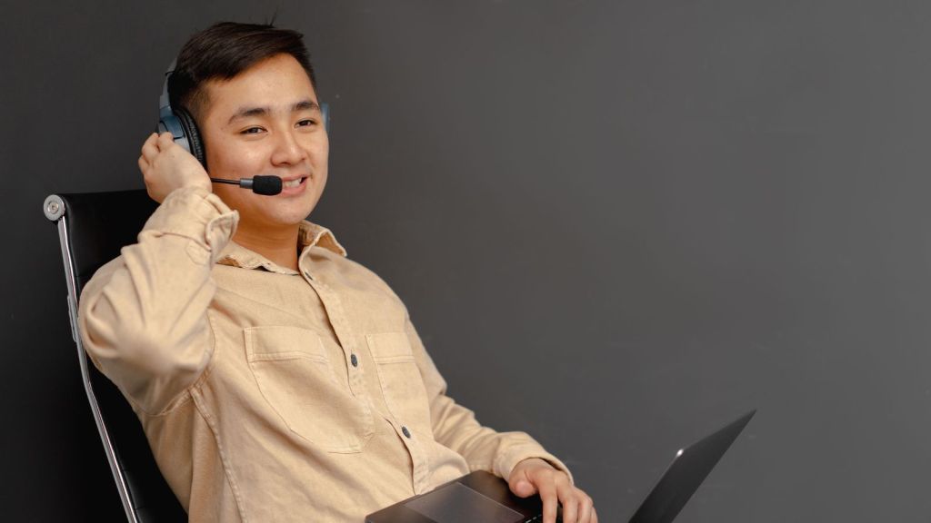 Man in work wearing a headset