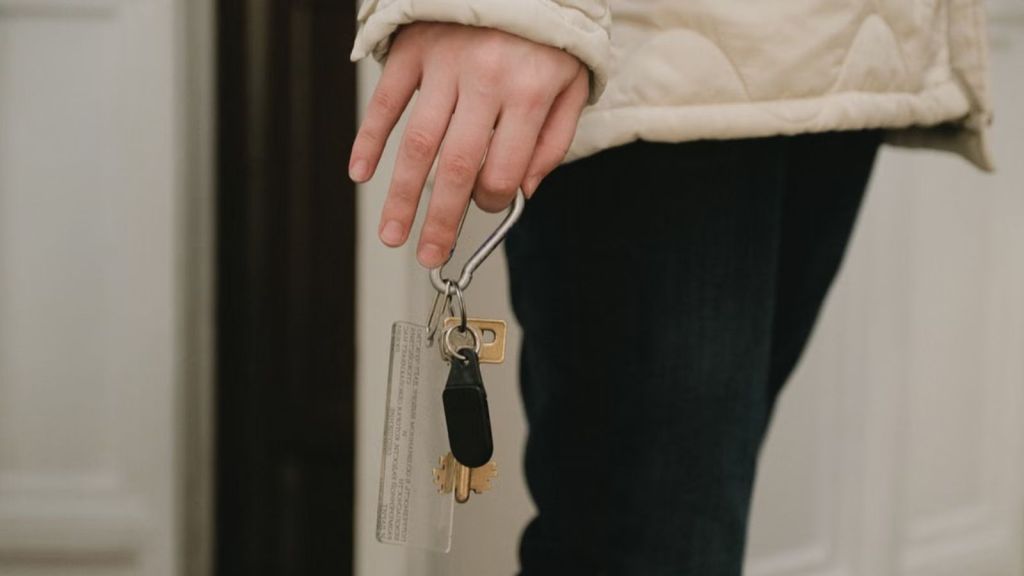 Woman carrying a keychain with keys in it