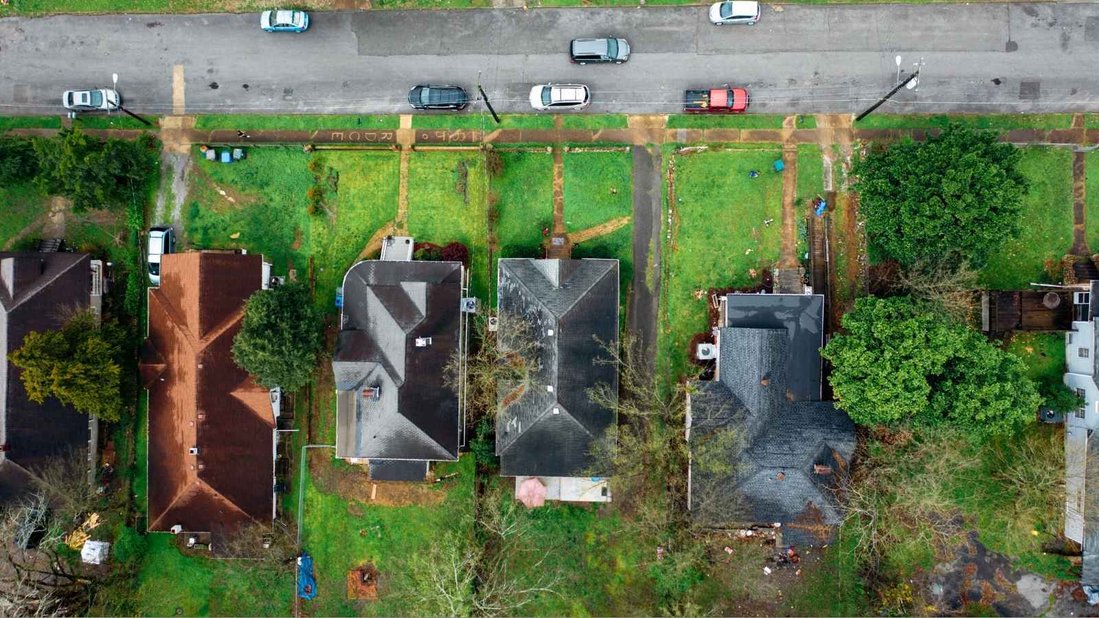 A Familys Multi Generational Peace Was Shattered by New Neighbors—and Nobody Did a Thing to Stop It aerial shot of neighborhood