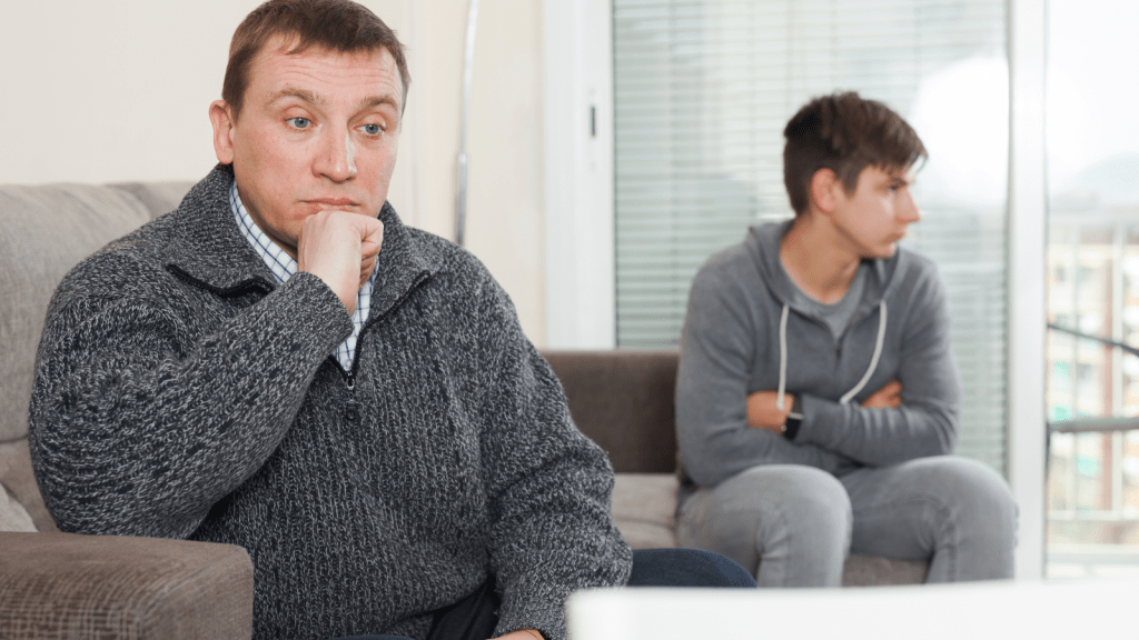 annoyed young man and his dad