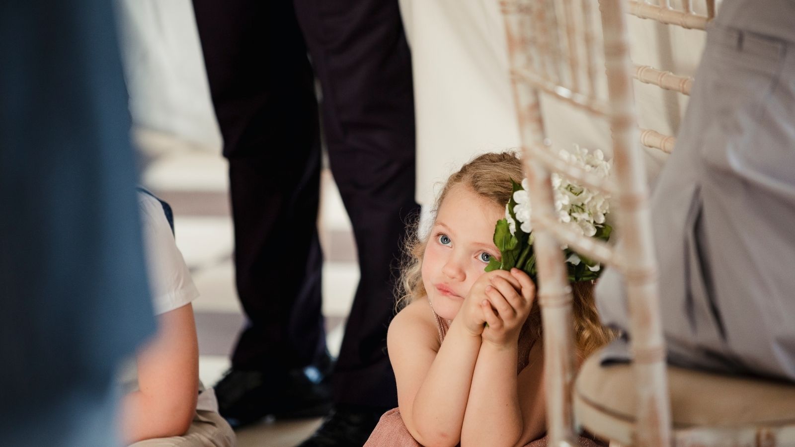 Man Thought His Wedding Timeline Was Completely Normal, But His Coworker Said It Was Inconsiderate Because It Left Guests With Nothing To Do For A Couple Hours flower girl bored at wedding