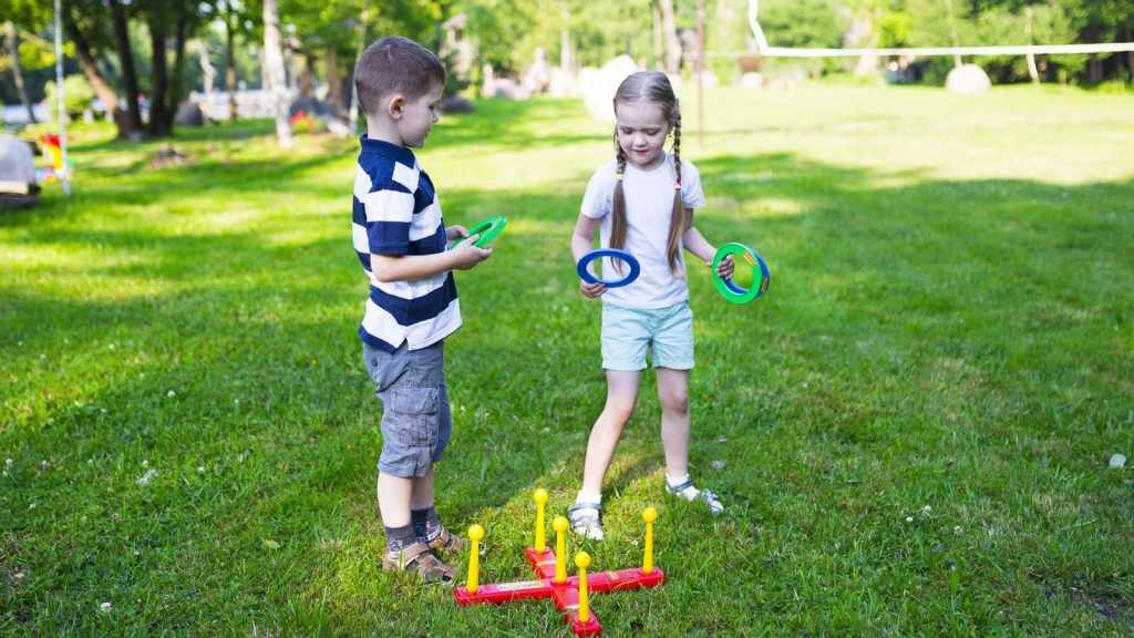boy and girl playing outside