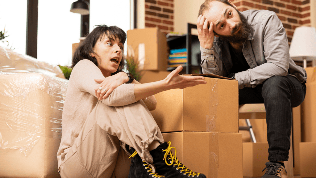 boyfriend and girlfriend arguing while moving out