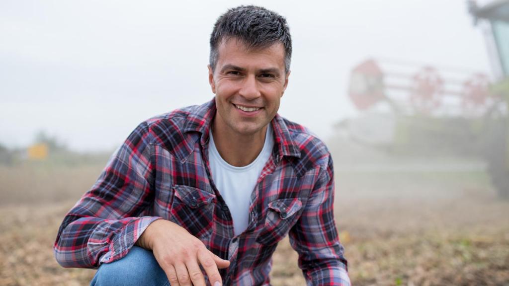 man smiling at a camera