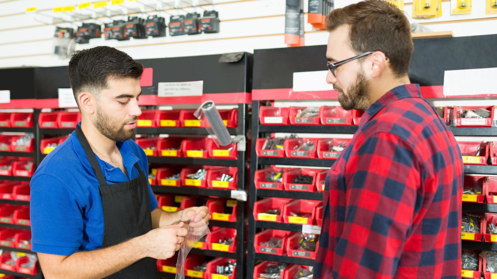 He Was Just Trying to Clean the Aisles—Then an Entitled Customer Demanded to Teach Him How to Sweep worker and customer in hardware store