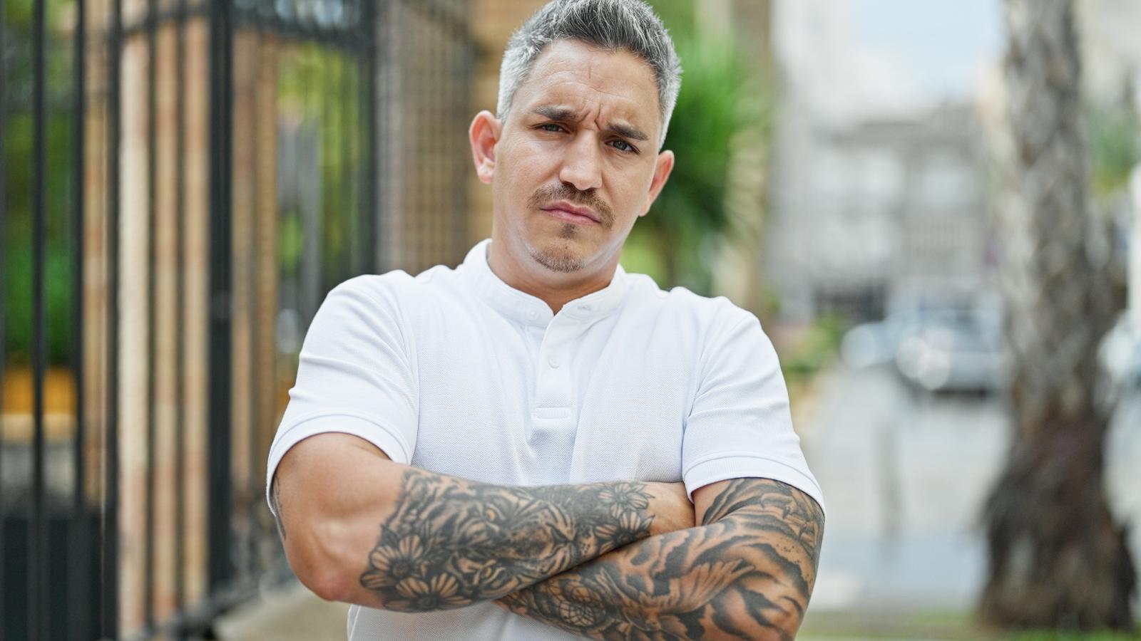 man with his arms crossed