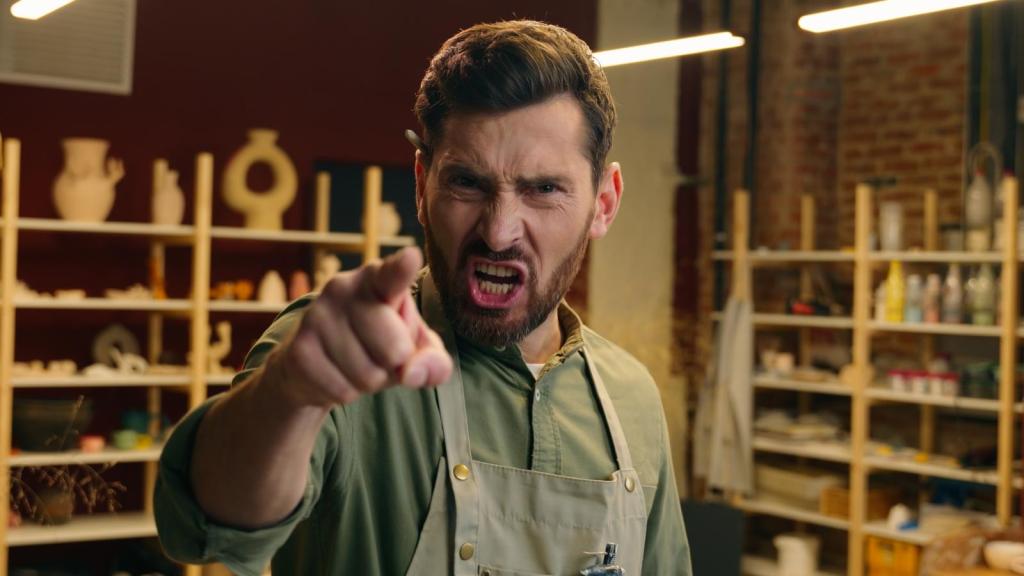 man pointing in anger