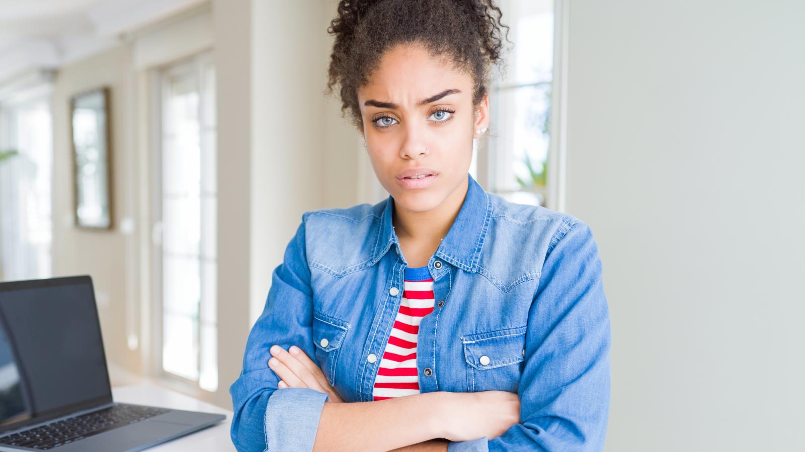 She Refused to Stay Late to Cover for a Coworker — Now Her Boss Wants an Apology woman with a serious look