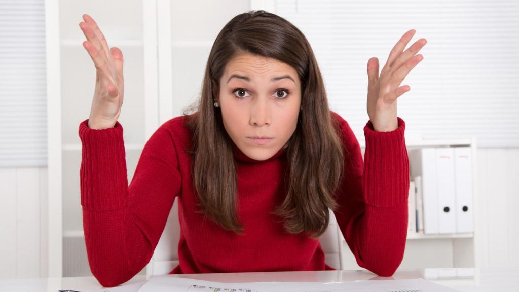woman shrugging her shoulders