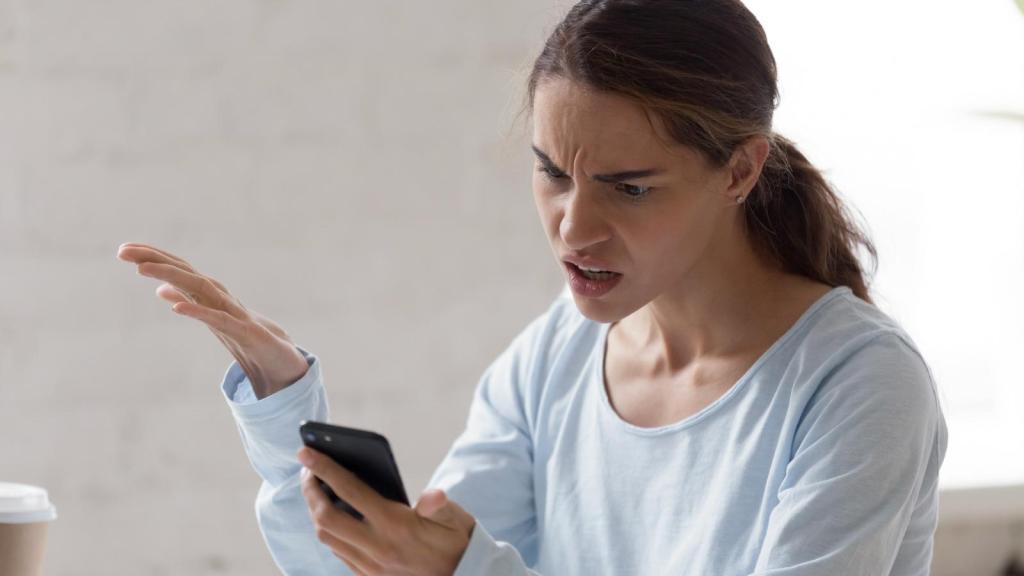 woman looking at her phone