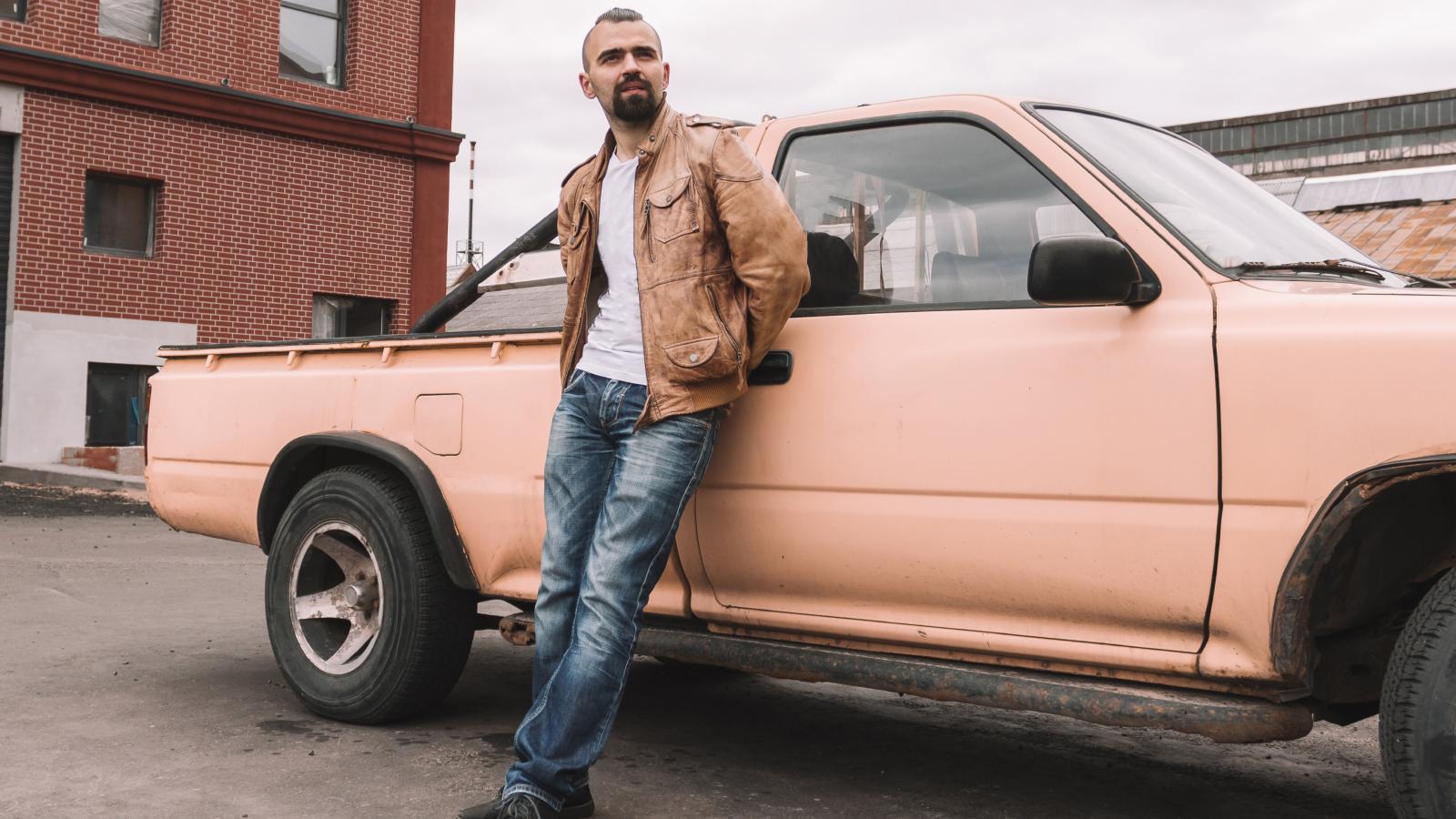 man next to a truck