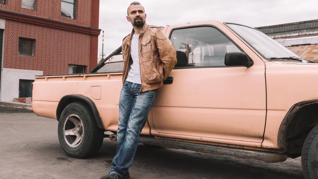 man next to a truck