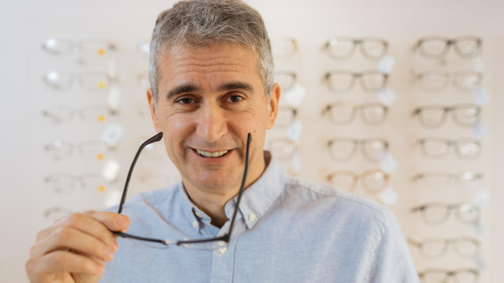 condescending shopper taking off glasses
