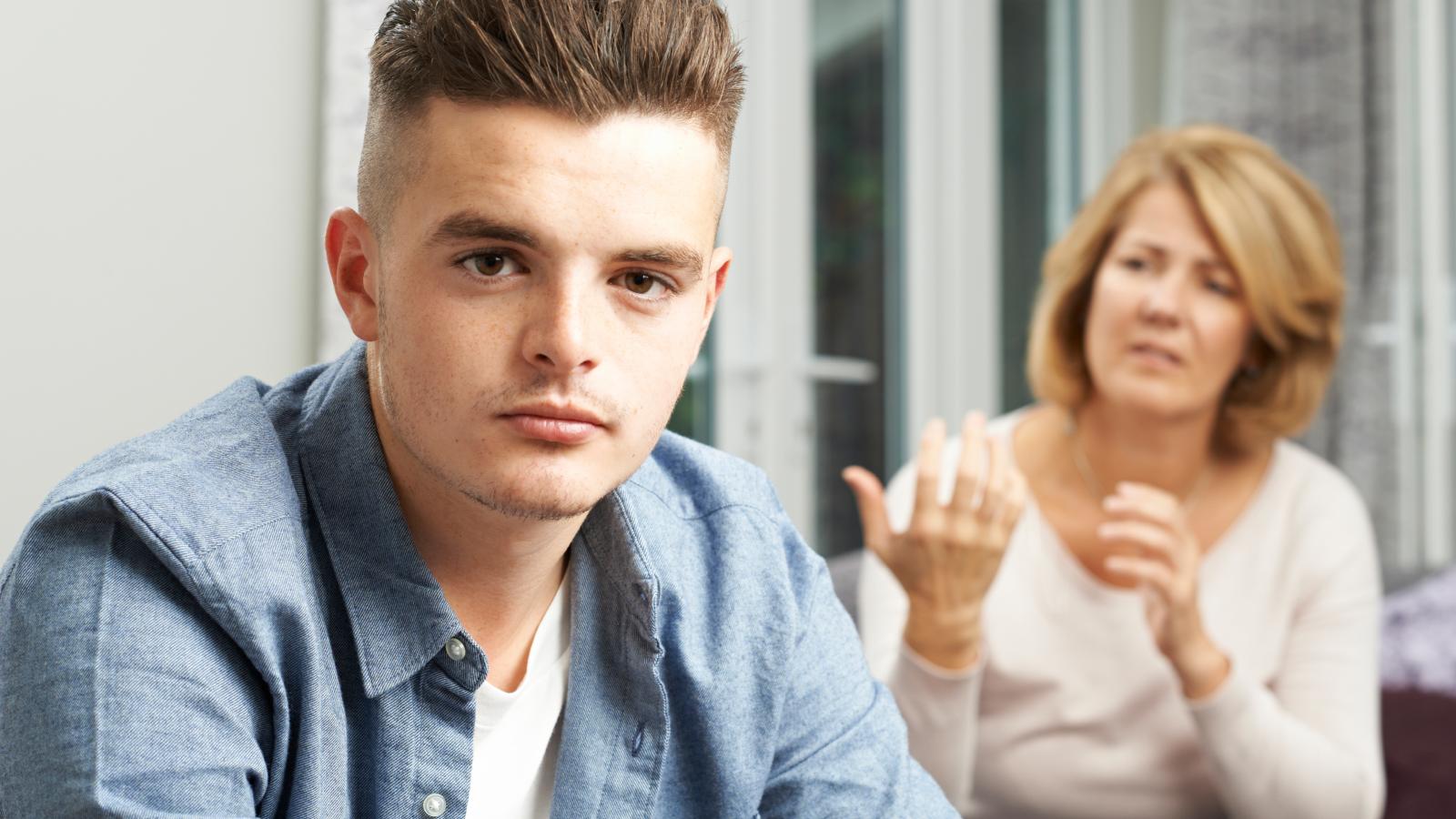 He Was in a Video Job Interview When His Mom Walked In—But She Stayed Until It Was Over man with his mother