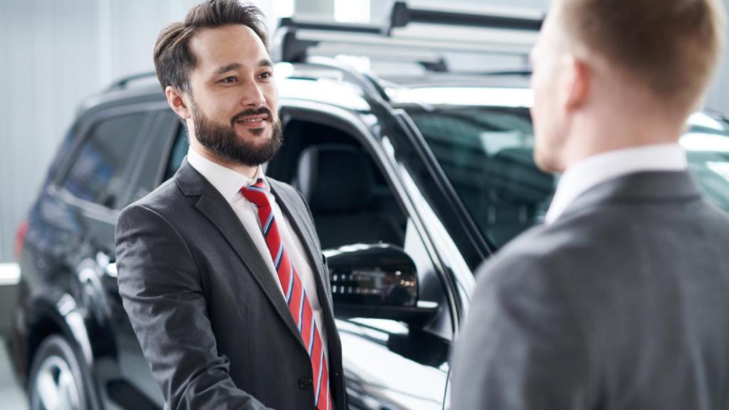 man with a car salesman