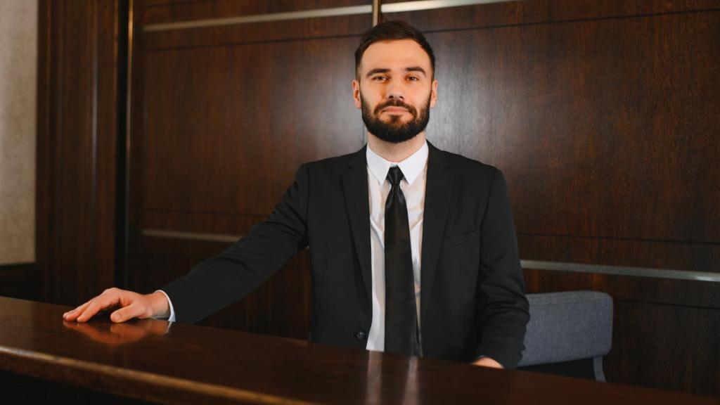 man at a hotel front desk