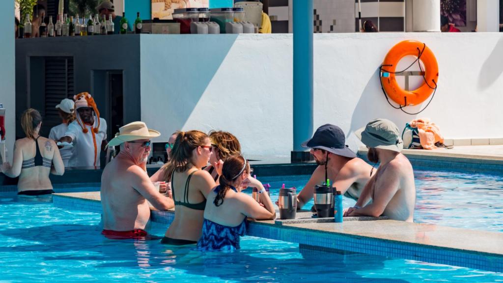 people drinking in a pool