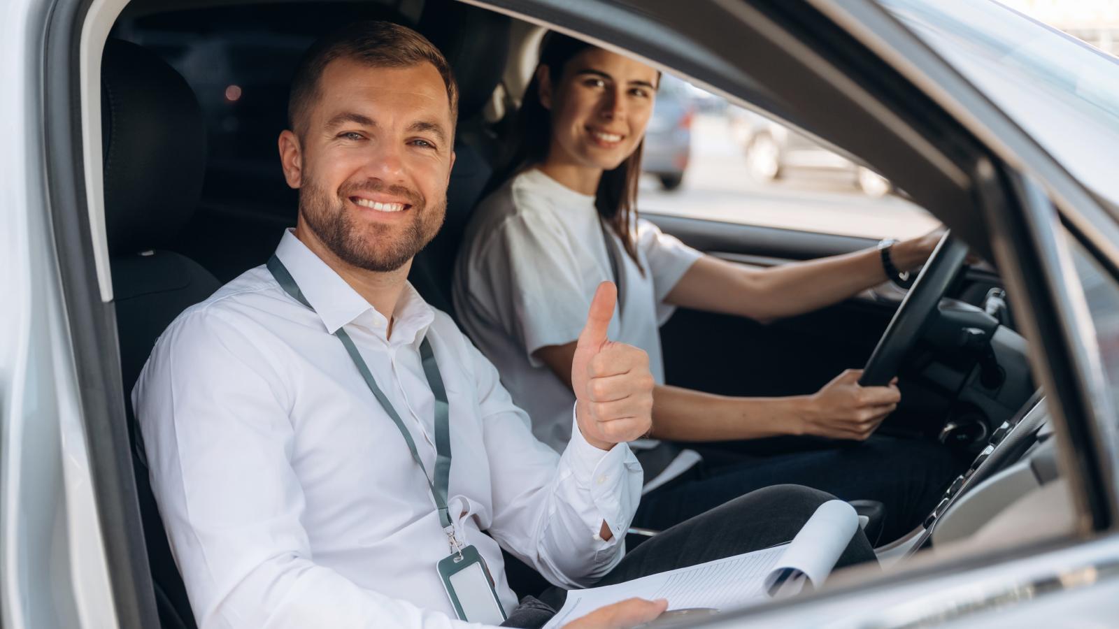 A Driving Instructor Taught a Teenager Who Refused to Stop Sucking Her Thumb Behind the Wheel man in a car with a girl