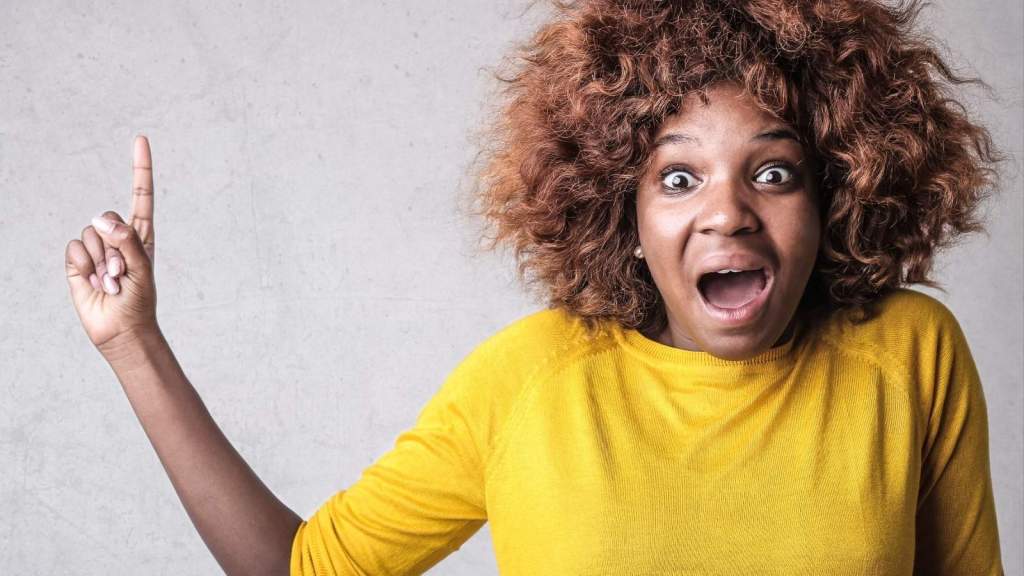 crazy woman in yellow shirt pointing