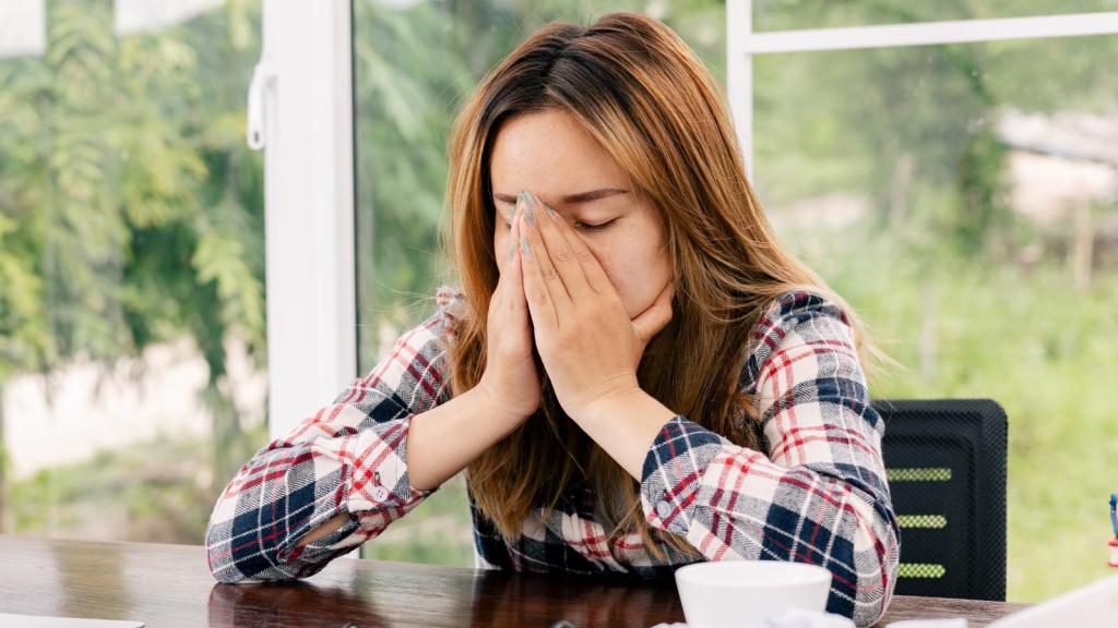 woman stressed out at her desk