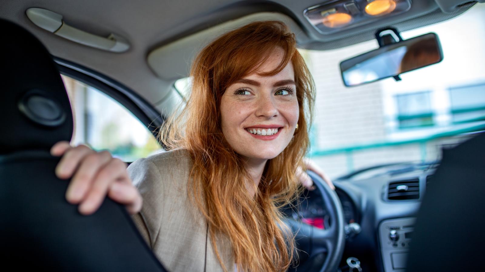 Her Neighbor Keeps Demanding She Stop Parking on the Public Street—So She Keeps Parking There Anyway woman driving a car