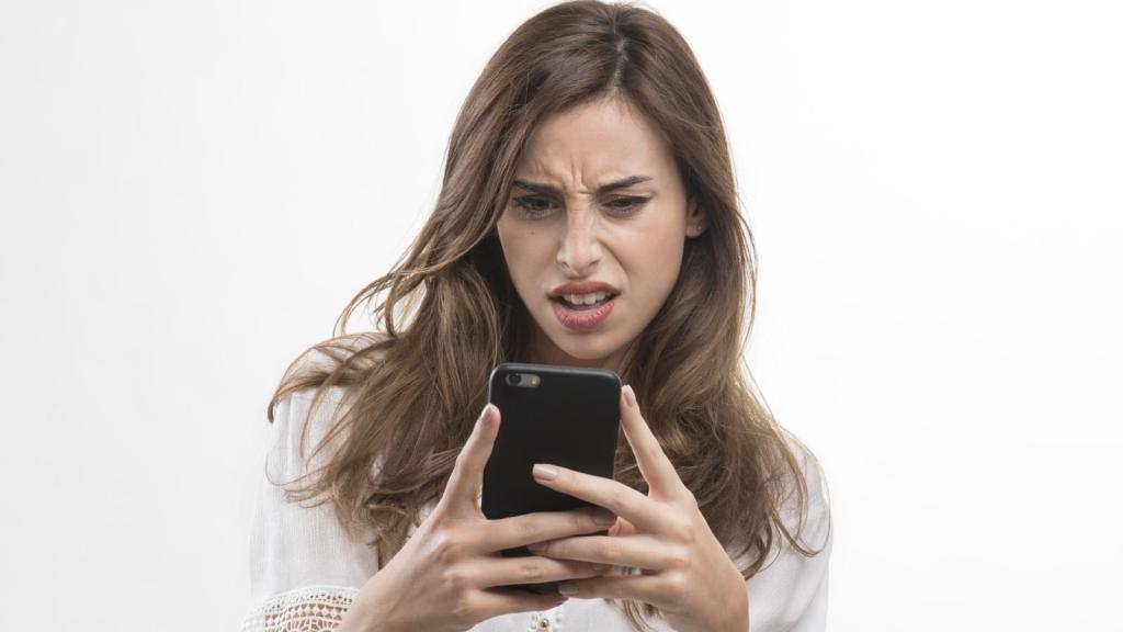 woman looking at her phone
