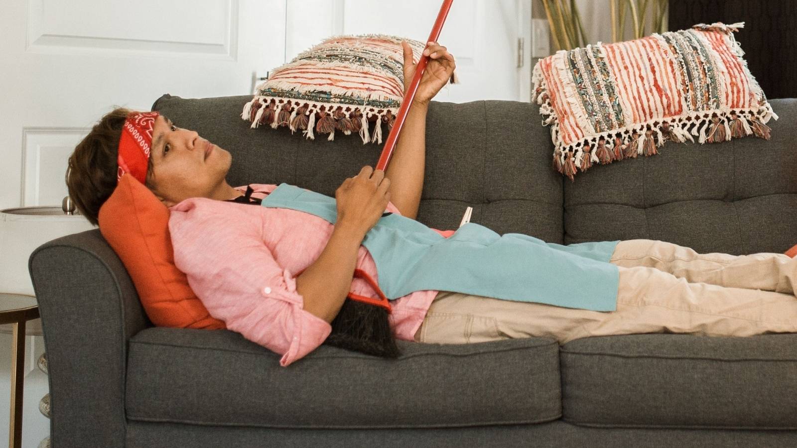 My Husband Cant Say No To His Family, So Im Hosting Six Extra Dinner Guests A Week After Moving In exhausted woman laying on the couch