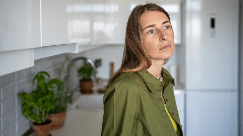 frustrated young woman thinking to herself