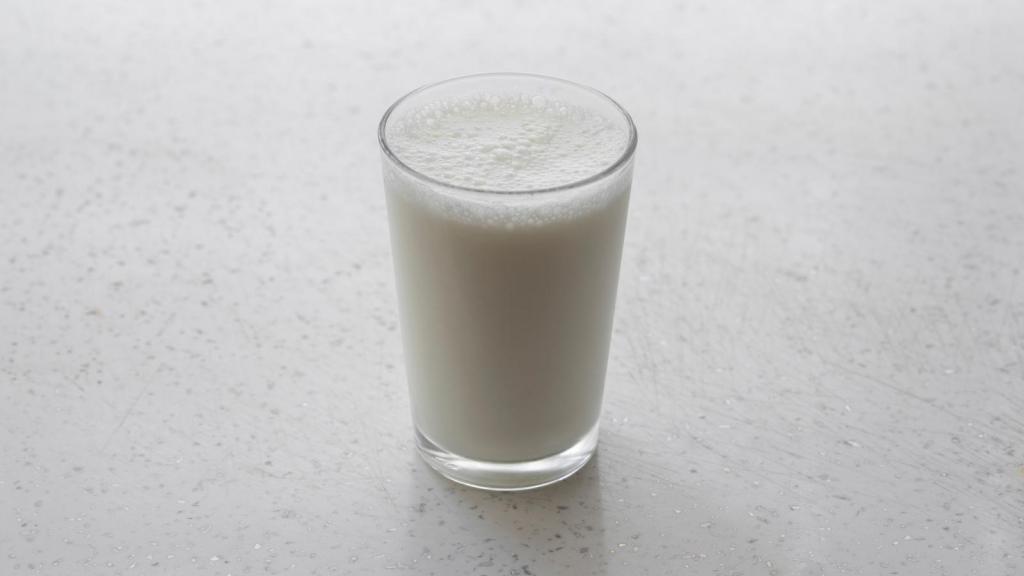 glass of milk on counter