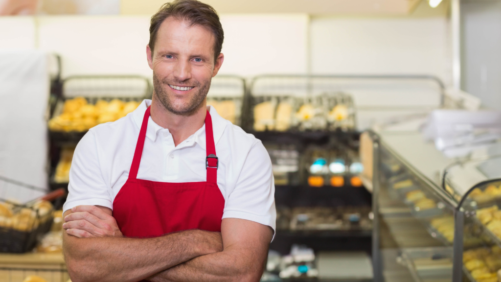 After A Store Worker Asked Whether She Needed Assistance, One Customer Skipped The Small Talk And Immediately Requested To Speak With Management grocery store worker smiling and folding arms