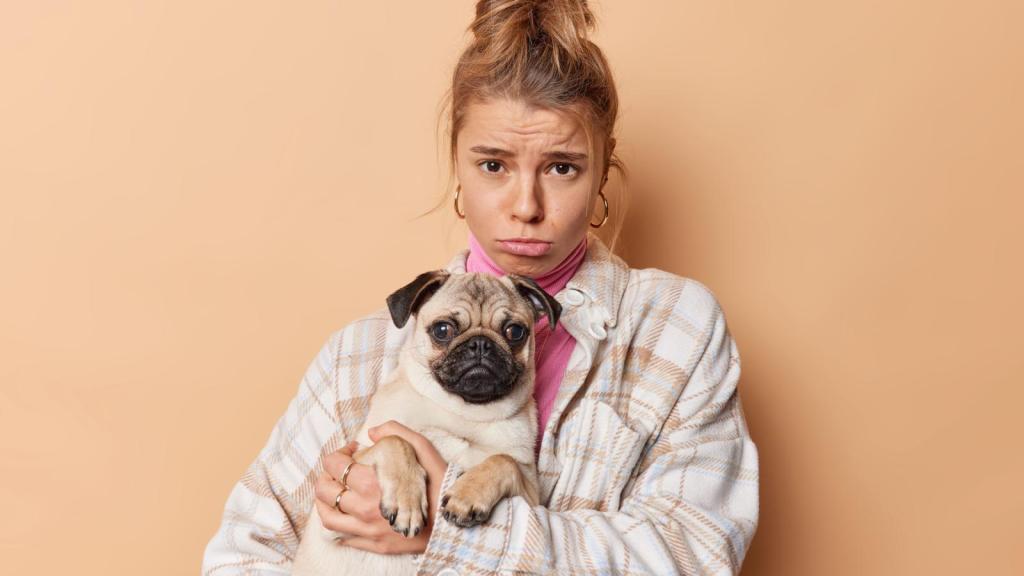 woman holding a dog