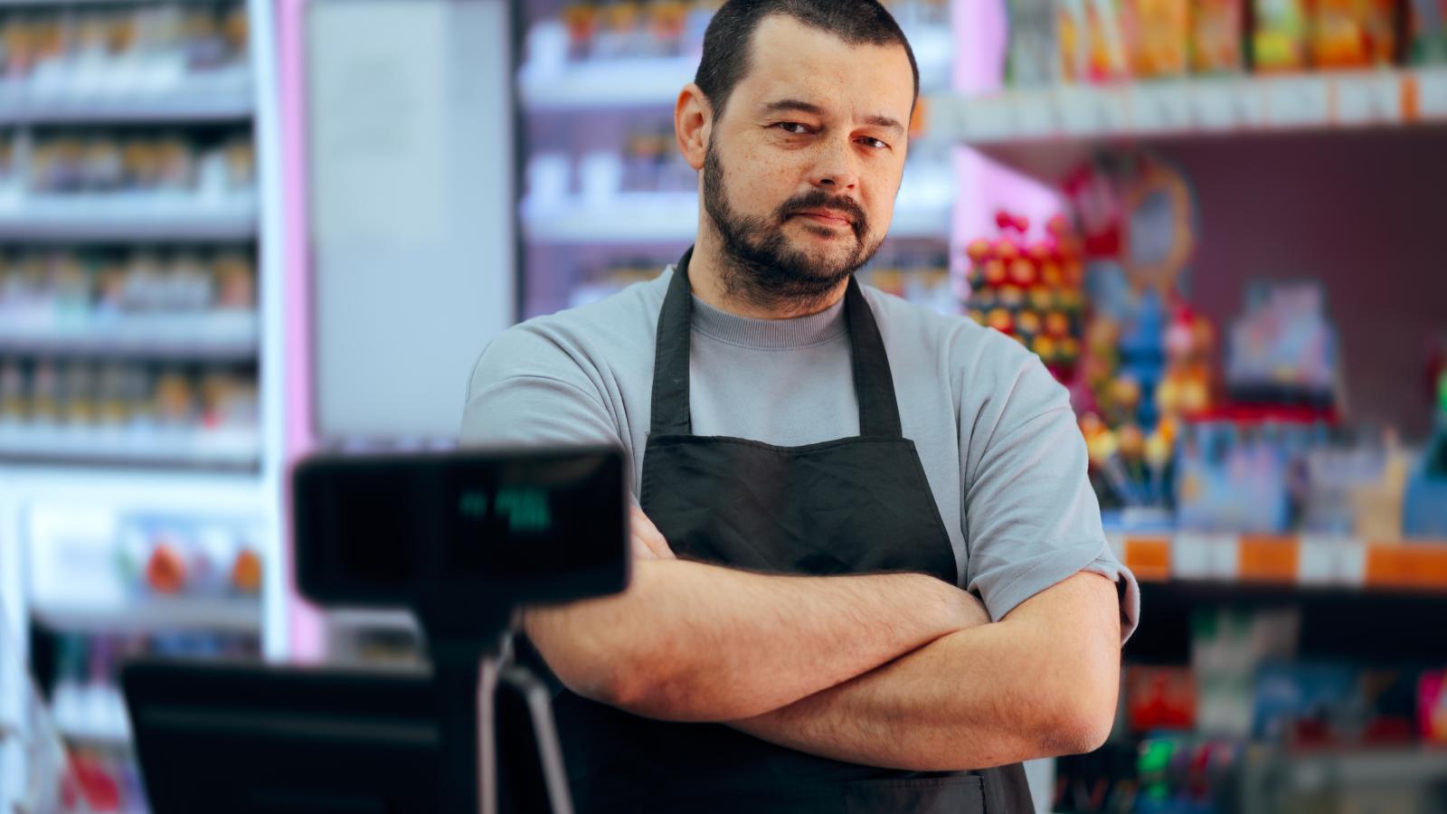 Its Illegal!: Photo Lab Tech Denies Order, Triggering Furious Retail Meltdown man working in a store