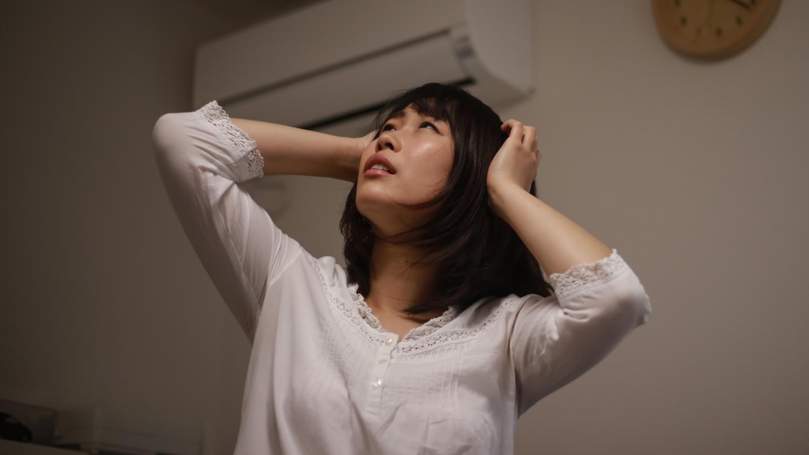 woman looking at her ceiling