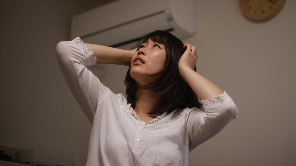 woman looking at her ceiling