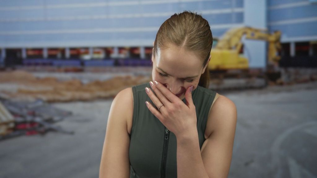 woman laughing at work site