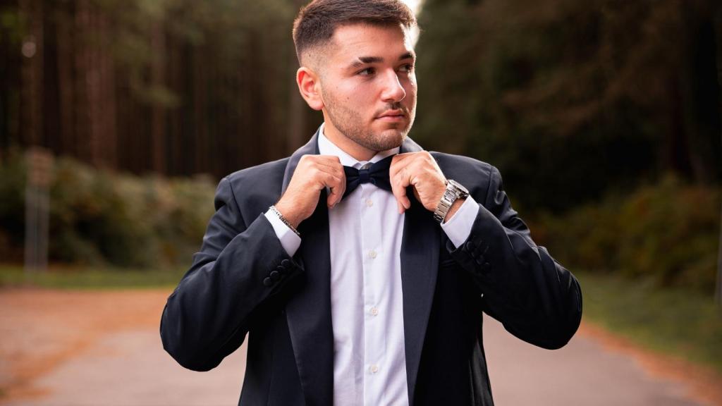 man dressed in a tuxedo suit