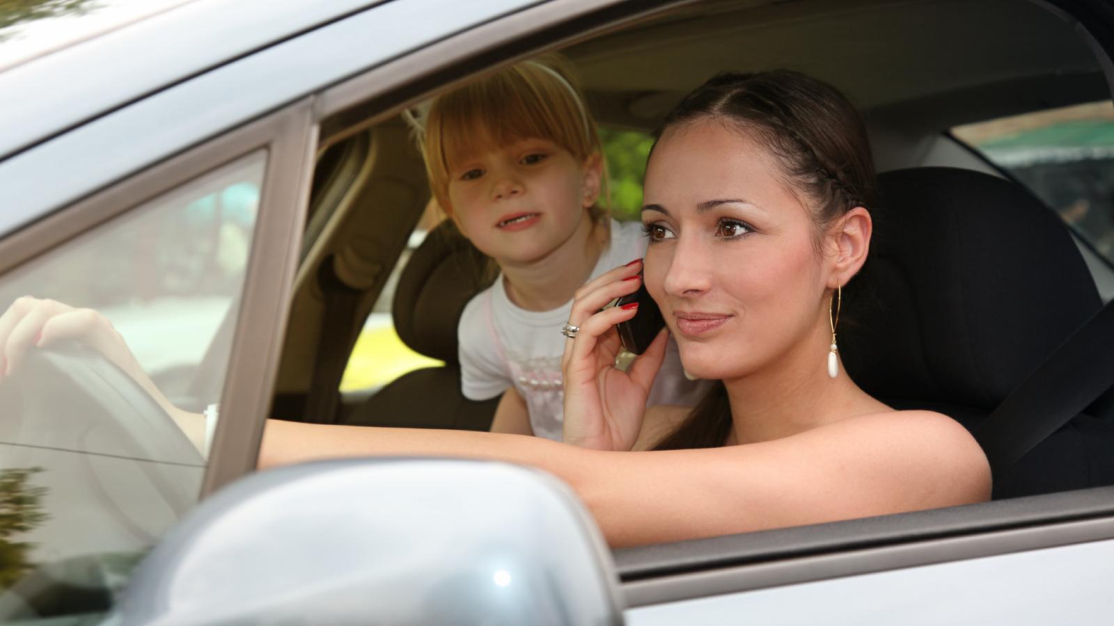 She Kept Stopping Her Road Trip for Her Daughter—and Got Furious When Her Friends Refused to Wait woman in a car with her daughter