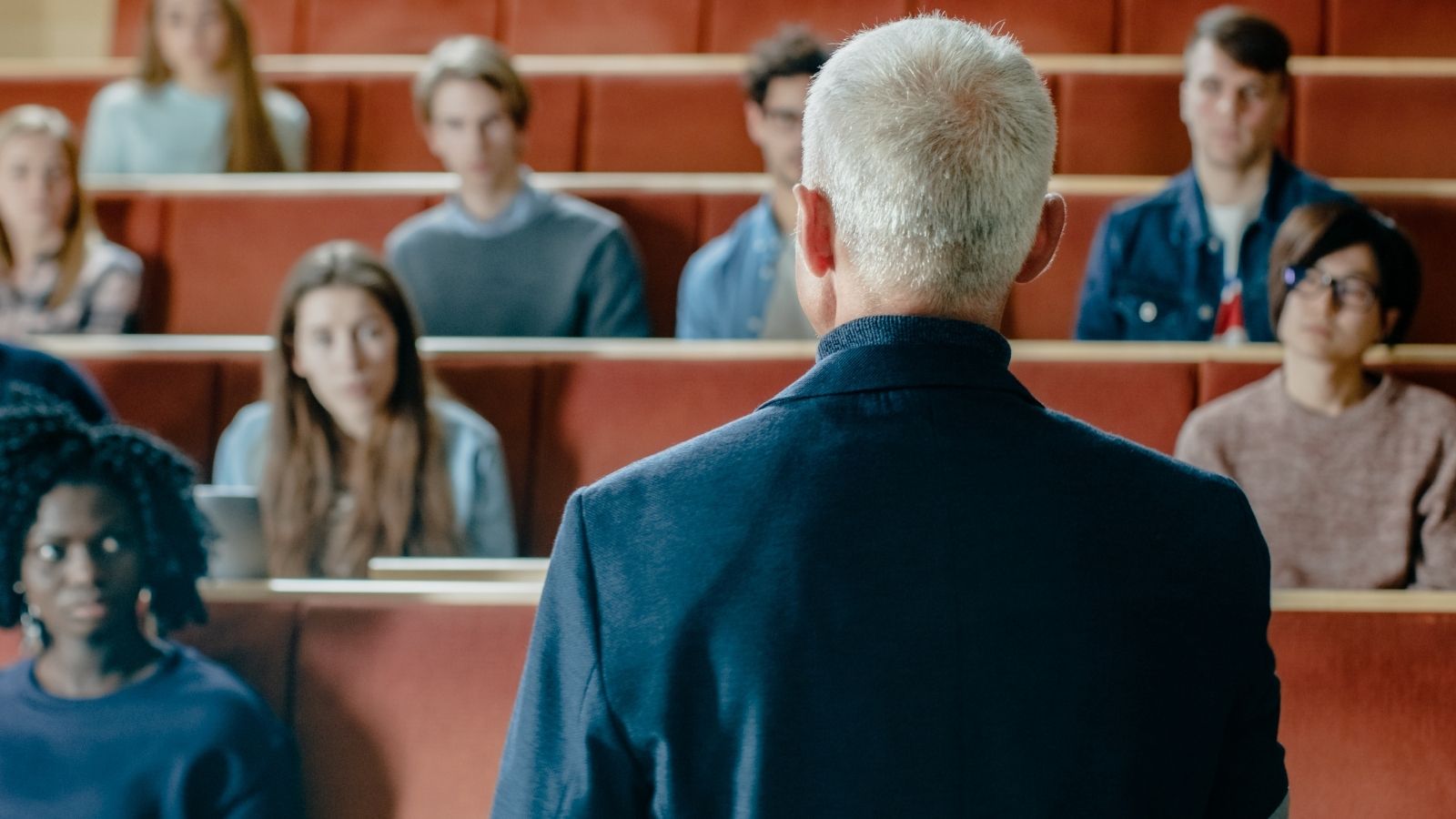 college professor giving a lecture